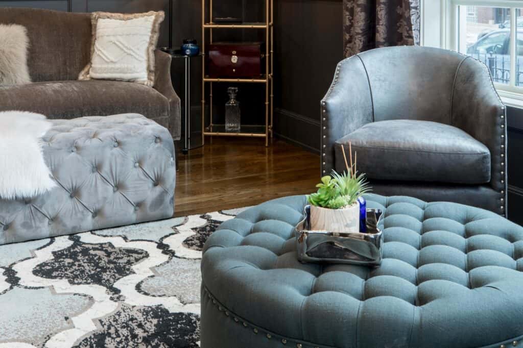 A living room with bulky seats